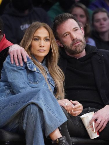 Jennifer Lopez, left, and Ben Affleck attend an NBA basketball game between the Los Angeles Lakers and the Boston Celtics Tuesday, Dec. 7, 2021, in Los Angeles. (AP Photo/Marcio Jose Sanchez)