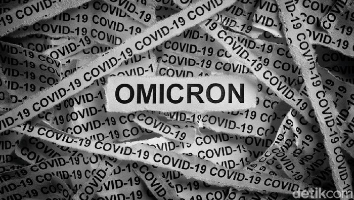 Strips of newspaper with the words Omicron and Covid-19 typed on them. Omicron variant of COVID-19. Black and white. Close up.