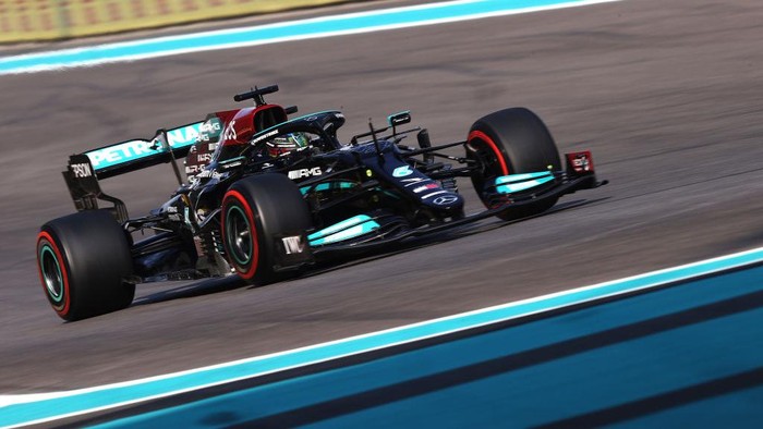 ABU DHABI, UNITED ARAB EMIRATES - DECEMBER 11: Lewis Hamilton of Great Britain driving the (44) Mercedes AMG Petronas F1 Team Mercedes W12 during final practice ahead of the F1 Grand Prix of Abu Dhabi at Yas Marina Circuit on December 11, 2021 in Abu Dhabi, United Arab Emirates. (Photo by Lars Baron/Getty Images)