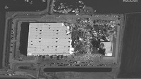 Tampak sebagian bangunan rata dengan tanah. Satellite image ©2021 Maxar Technologies via AP.