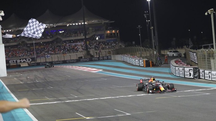 Red Bull driver Max Verstappen of the Netherlands wins the Formula One Abu Dhabi Grand Prix in Abu Dhabi, United Arab Emirates, Sunday, Dec. 12, 2021. (AP Photo/Kamran Jebreili, Pool)