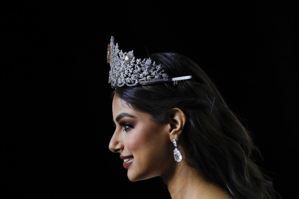 Newly crowned Miss Universe 2021 Harnaaz Sandhu poses during a press conference following the 70th Miss Universe pageant, Monday, Dec. 13, 2021, in Eilat, Israel. (AP Photo/Ariel Schalit)