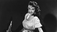 Di Cattle Town, Rita Moreno memerankan karakter bernama Queli. (Foto: Getty Images/Keystone)