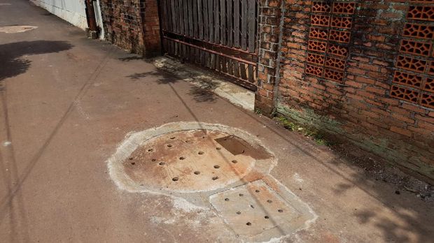 Sumur resapan di jl Sirsak, Pasar Minggu, Jakarta Selatan sudah rapi. Tidak ada lagi lubang atau gundukan tanah.