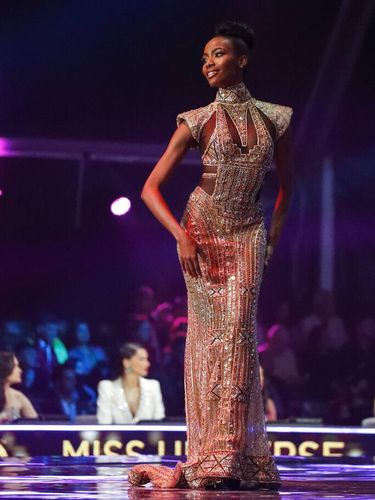 India's Harnaaz Sandhu participates in the evening gown stage of the 70th Miss Universe pageant, Monday, Dec. 13, 2021, in Eilat, Israel. (AP Photo/Ariel Schalit)