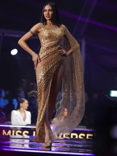 India's Harnaaz Sandhu participates in the evening gown stage of the 70th Miss Universe pageant, Monday, Dec. 13, 2021, in Eilat, Israel. (AP Photo/Ariel Schalit)