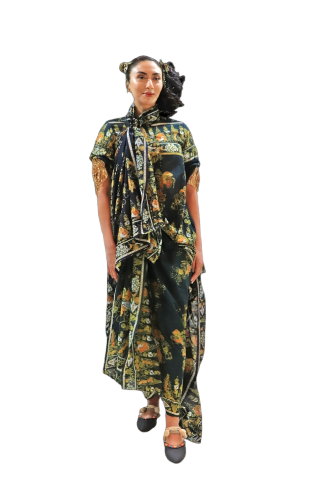 Desainer Mel Ahyar menampilkan koleksi busananya yang bertema Juxtapose di Heya Arabian Fashion Exhibition di Doha, Qatar.  Foto: dok. KBRI Doha.