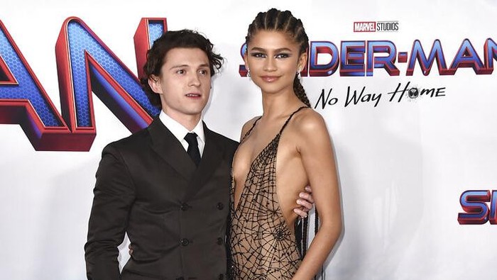 Tom Holland, left, and Zendaya arrive at the premiere of 