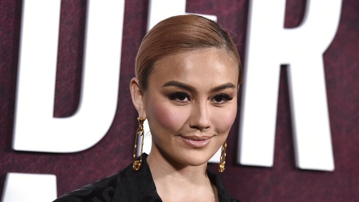 Agnez Mo arrives at the premiere of The Tender Bar on Sunday, Dec. 12, 2021, at the TCL Chinese Theatre in Los Angeles. (Photo by Jordan Strauss/Invision/AP)