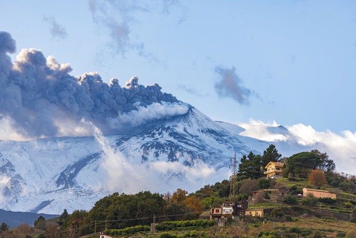 Italy Etna Volcano Mount Etna erupts in Catania, in southern Italy, on Tuesday, Dec. 14, 2021. (AP Photo/Salvatore Allegra)