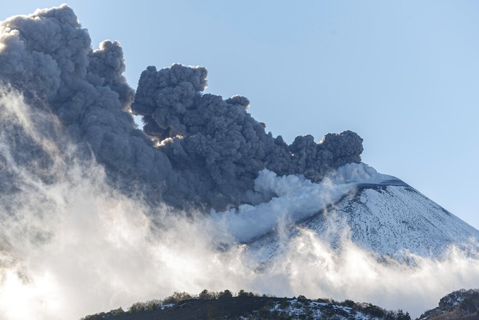 Mount Etna erupts in Catania, in southern Italy, on Tuesday, Dec. 14, 2021. (AP Photo/Salvatore Allegra)