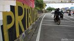 Mural Kain Serbet Sindir RUU Perlindungan PRT yang Belum Disahkan