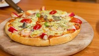 Hidangan shrimp cocktail atau cocktail udang sangat populer di Amerika. Rasanya segar dan menggugah selera. Kepopulerannya ini membuat salah satu gerai pizza menjadikannya topping. Foto: SCMP