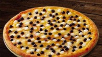 Taiwan terkenal dengan minuman boba atau bubble tea. Tak hanya dicampur bersama minuman, ada gerai pizza yang juga menjadikan boba sebagai topping. Dipadukan dengan keju yang lumer. Foto: SCMP