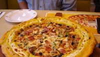 Orang Korea Selatan diketahui sangat menyukai ubi jalar. Sampai membuat salah satu restoran pizza menyajikan menu dengan topping ubi yang telah dihaluskan. Kombinasi lainnya ditambahkan cranberries, almond, dan potongan nanas. Foto: SCMP