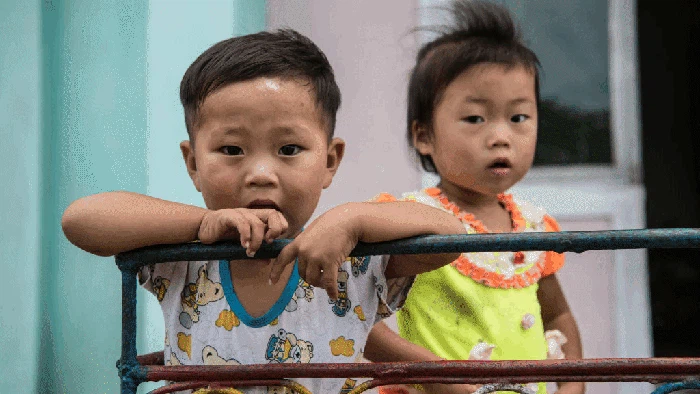 1024307064 PYONGYANG, NORTH KOREA - AUGUST 23: Young ballerinas practice during a lesson at Mansyongdae School Childrens' Palace on August 23, 2018 in Pyongyang, North Korea. Despite ongoing international negotiations aimed at easing tensions on the Korean peninsula, the Democratic People's Republic of Korea remains the most isolated and secretive nation on earth. Since it's formation in 1948 the country has been led by the Kim dynasty, a three-generation lineage of North Korean leadership descended from the country's first leader, Kim Il-sung followed by Kim Jong-il and grandson and current leader, Kim Jong-un. Although major hostilities ceased with the signing of the Armistice in 1953, the two Koreas have remained technically at war and the demilitarised zone along the border continues to be the most fortified border in the world. (Photo by Carl Court/Getty Images)