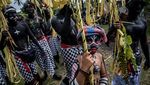 Tradisi Mewarnai Diri Untuk Mengusir Roh Jahat di Bali