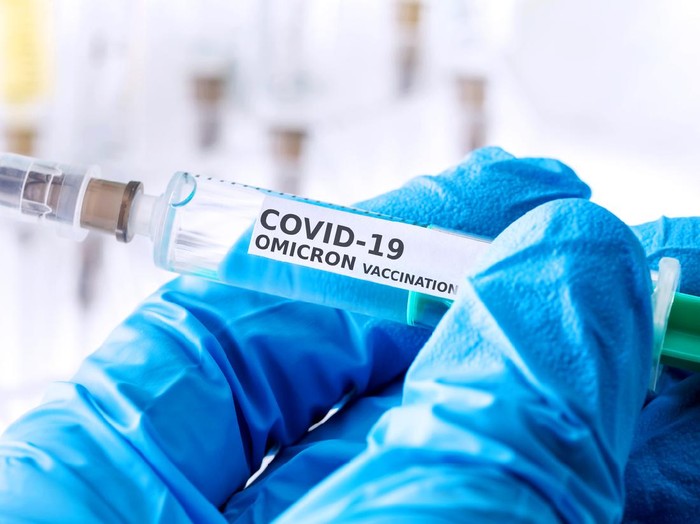 covid-19 omicron variant vaccination concept