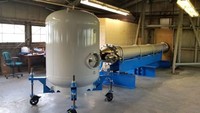 Tim peneliti melakukan tur fasilitas di Inggris dan menetapkan konsep desain dari Royal Aeronautical Establishment, sebuah meriam yang ditenagai oleh udara terkompresi.