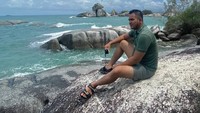 Pulang Kelayang dengan Background Batu Garuda