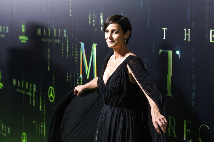 Carrie-Anne Moss arrives at the premiere of 