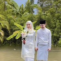 Malaysia mengalami bencana banjir bandang yang terjadi akhir pekan lalu. Aktivitas warga pun menjadi terhambat. Termasuk pengantin yang ingin mengadakan acara pernikahan. Foto: Dok. Tangkapan layar akun TikTok @asyikonnnnnnnnnn.