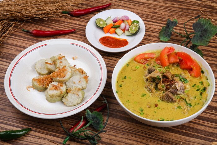 Empal Gentong is a traditional food from Cirebon Indonesia. consisting of meat soup with coconut milk soup