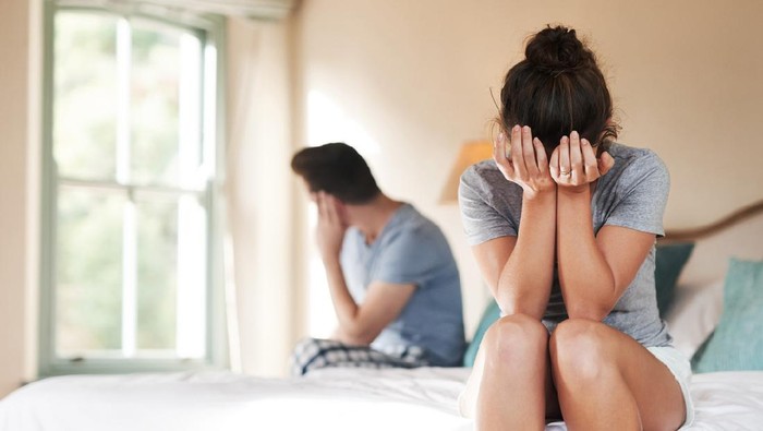 Shot of a young couple having an argument in their bedroom at home