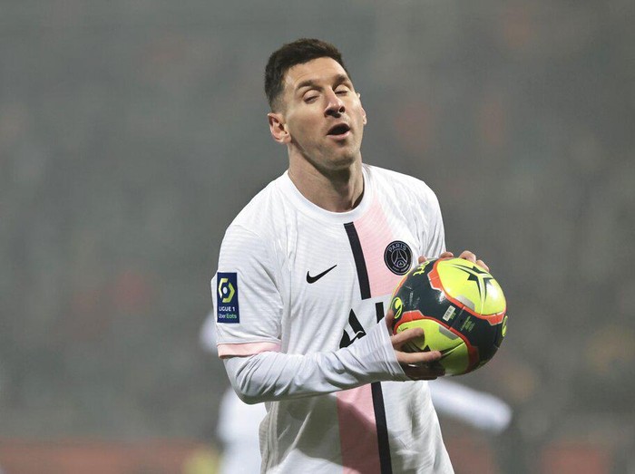PSG's Lionel Messi reacts during the French League One soccer match between FC Lorient and Paris Saint-Germain at the Moustoir stadium in Lorient, western France, Wednesday, Dec. 22, 2021. (AP Photo/Jeremias Gonzalez)