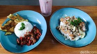 Keju mozzarella yang disajikan pun terbilang royal dan banyak. Sayangnya, justru menurut kami daging ikan dori yang digunakan terlalu sedikit dan kecil potongannya.  Foto: detikFood/Devi S. Lestari