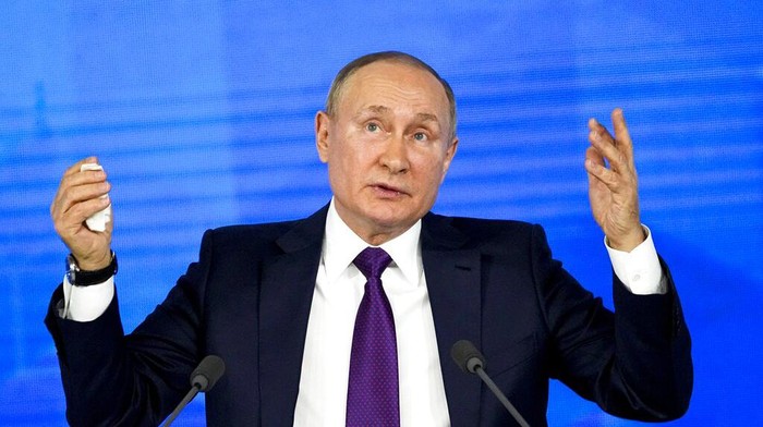 Russian President Vladimir Putin gestures during his annual news conference in Moscow, Russia, Thursday, Dec. 23, 2021. Putin has urged the West to 