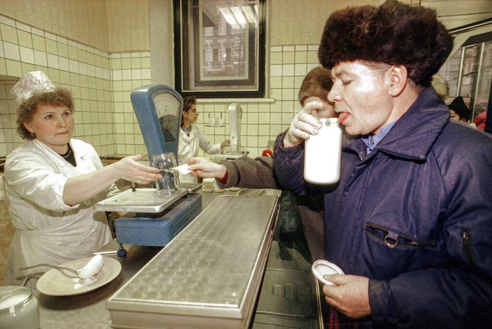 Russia Soviet Collapse Anniversary FILE - A man tastes the sour cream, the only remaining dairy product available, at a state-owned store in Moscow, Monday, Dec. 24, 1991. By the fall of 1991, however, deepening economic woes and secessionist bids by Soviet republics had made the collapse all but inevitable. The failed August 1991 coup by the Communist old guard was a major catalyst, dramatically eroding Gorbachevβs authority and encouraging more republics to seek independence. (AP Photo/Alexander Zemlianichenko, File)