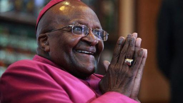 (FILES) In this file photo taken on April 23, 2014 Nobel Peace Laureate Archbishop Desmond Tutu gestures during a press conference about the first 20 years of freedom in South Africa at St Georges Cathedral in Cape Town . - South African anti-apartheid icon Desmond Tutu, described as the countrys moral compass, died on December 26, 2021, aged 90, President Cyril Ramaphosa said. (Photo by Jennifer BRUCE / AFP)