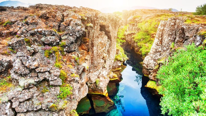 Cliffs and deep fissure in Thingvellir National Park, southern Iceland. Famous travel destination