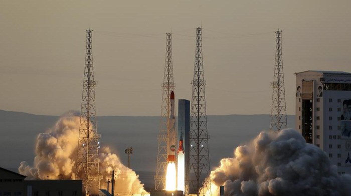 This photo released by the official website of the Iranian Defense Ministry on Thursday, Dec. 30, 2021, shows the launching of Simorgh, or Phoenix, rocket in an undisclosed location in Iran. Iran on Thursday announced it launched a satellite carrier rocket bearing three devices into space, though its unclear whether any of the objects entered orbit around the Earth. (Iranian Defense Ministry via AP)