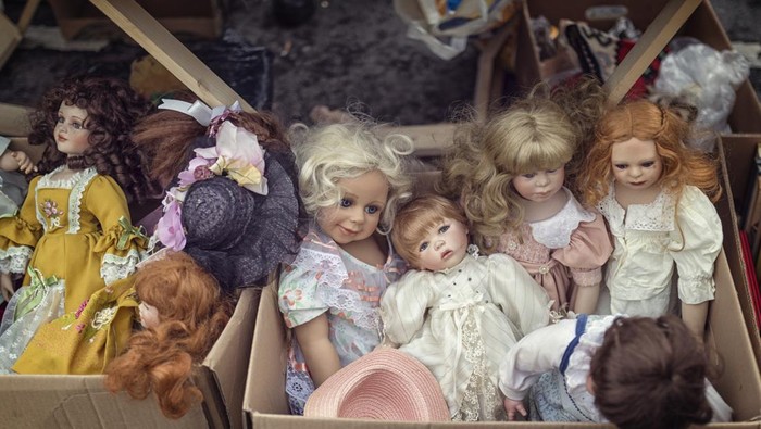 spooky vintage dolls at a flea market in vienna