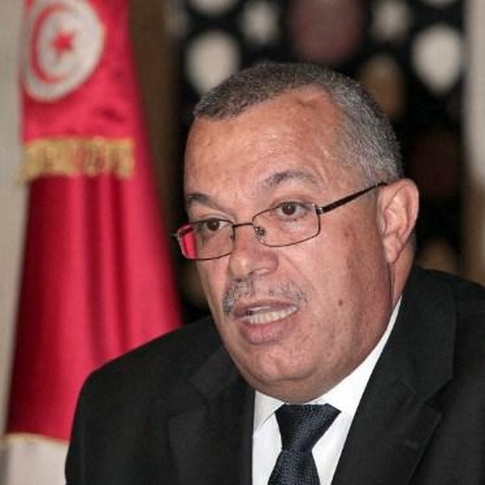 (FILES) In this file photo taken on June 25, 2012 Tunisian Justice Minister Noureddine Bhiri (R) speaks during a press conference in Tunis, following the extradition of former Libyan Prime Minister Baghdadi al-Mahmoudi. - Detained Tunisian politician Noureddine Bhiri has been rushed to hospital in a 
