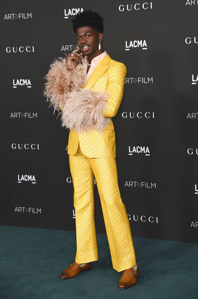Lil Nas X arrives at the LACMA Art + Film Gala on Saturday, Nov. 6, 2021, at the Los Angeles County Museum of Art in Los Angeles. (Photo by Richard Shotwell/Invision/AP)