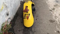 Ini tampilan belakang dari Volkspod basis dari Yamaha Mio tahun 2007. Pada area kaki-kaki juga berganti, Ikhsan mengatakan velg dan ban menggunakan lansiran Vespa ukuran ring 10. Foto: Hara Garage