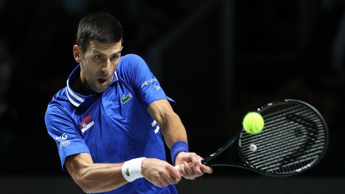 MADRID, SPAIN - DECEMBER 03: Novak Djokovic of Serbia plays a backhand to Marin Cilic of Croatia during the Davis Cup semi final between Serbia and Croatia at Madrid Arena on December 03, 2021 in Madrid, Spain. (Photo by Clive Brunskill/Getty Images)