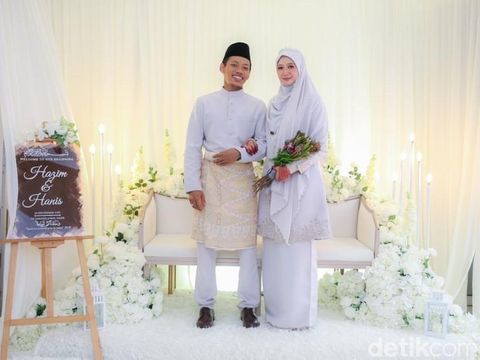 Foto pernikahan Hanis dan Hazim.