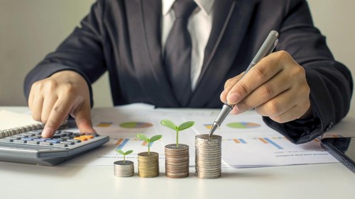 A businessman holding a coin with a tree that grows and a tree that grows on a pile of money. The idea of maximizing the profit from the business investment.
