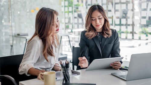 compass and fifty euro banknotes background business and finance concepts