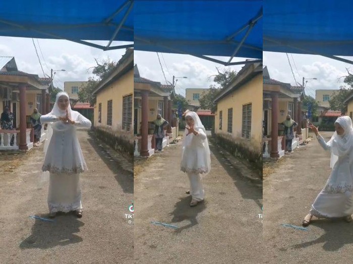 Pengantin viral lakukan atraksi silat. Pengantin viral lakukan atraksi silat.