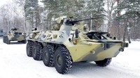 Tidak hanya pasukan, Rusia juga mengirim kendaraan militer. Russian Defense Ministry Press Service via AP.
