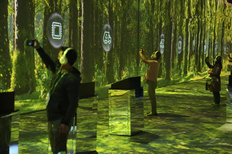 Attendees make their way through the Central Hall of the Las Vegas Convention Center prior to the CES tech show Tuesday, Jan. 4, 2022, in Las Vegas. The show runs from January 5-7. (AP Photo/Joe Buglewicz)