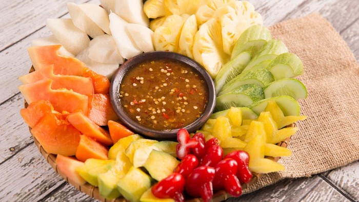 lotis buah or rujak. fruit with hot chili paste. indonesian traditional fruit salad
