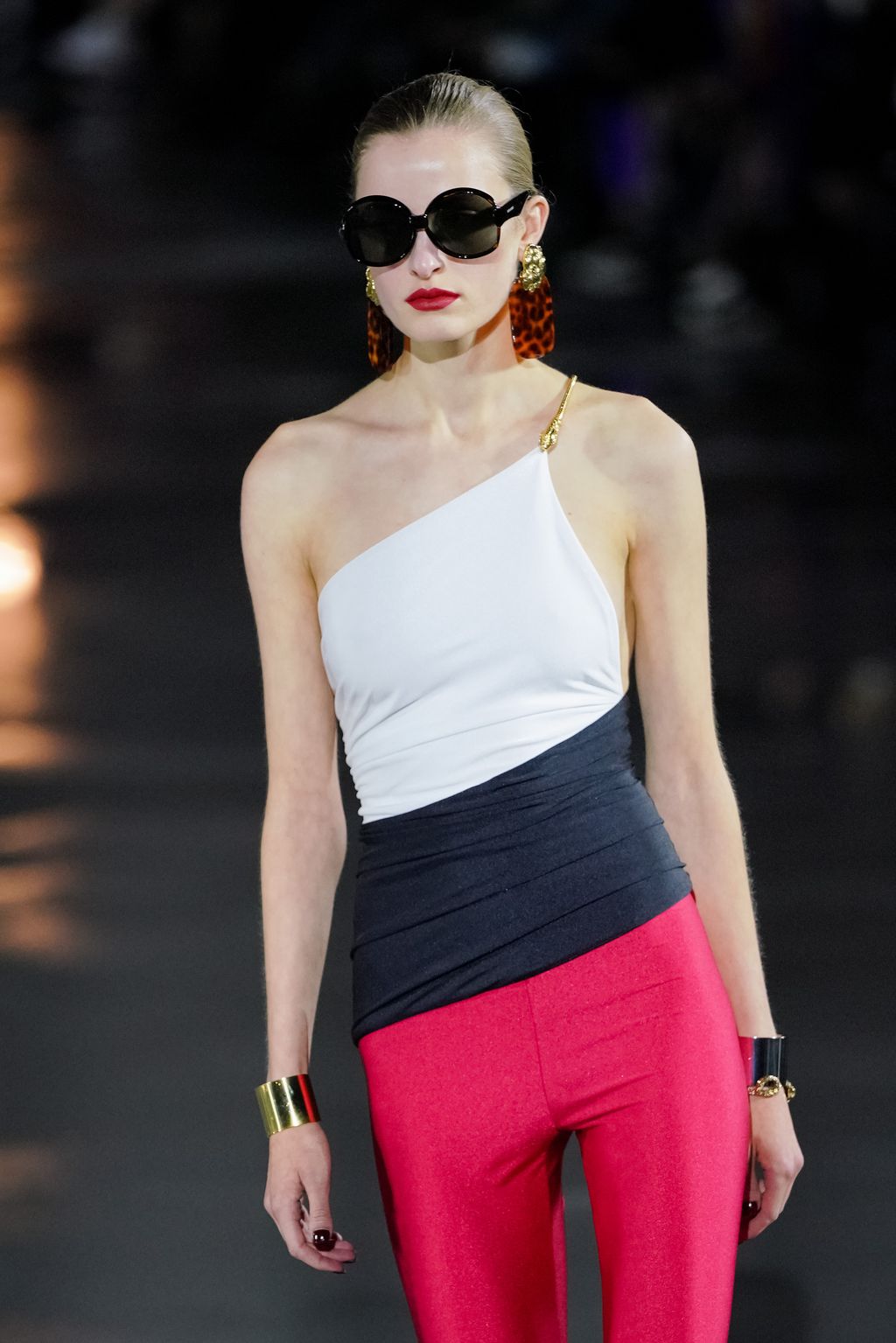 PARIS, FRANCE - SEPTEMBER 28: (EDITORIAL USE ONLY - For Non-Editorial use please seek approval from Fashion House) A model walks the runway during the Saint Laurent Womenswear Spring/Summer 2022 show as part of Paris Fashion Week on September 28, 2021 in Paris, France. (Photo by Francois Durand/Getty Images)