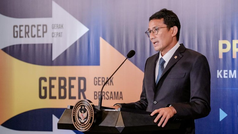 Menparekraf Sandiaga Uno Menparekraf Sandiaga Uno dalam jumpa pers, Senin (10/1/2022).