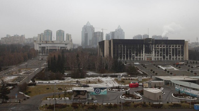 A view of the city hall building, right, after clashes in the central square blocked by Kazakhstan troops and police in Almaty, Kazakhstan, Monday, Jan. 10, 2022. The National Security Committee, Kazakhstan's counterintelligence and anti-terrorism agency, said that the situation in the country has 